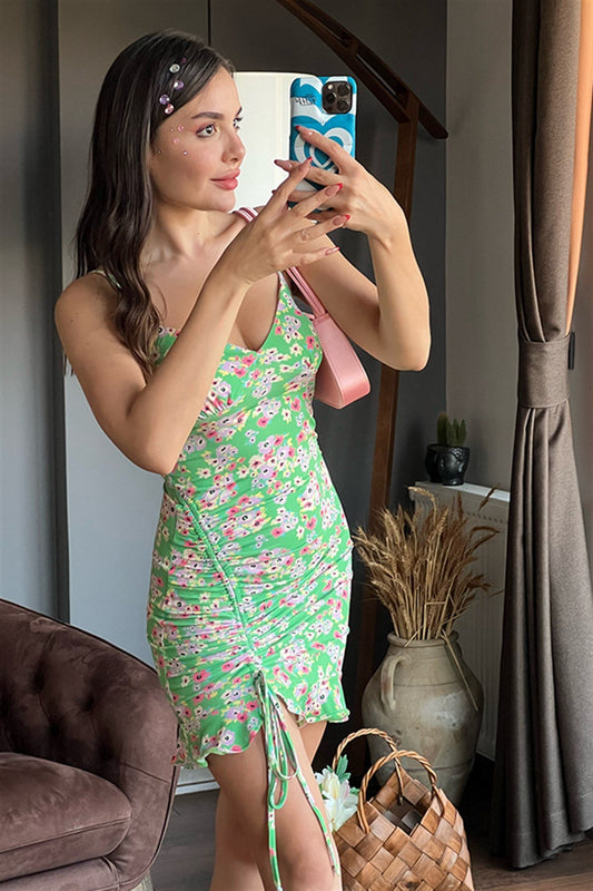 Fıstık yeşili önü büzgülü çiçekli elbise