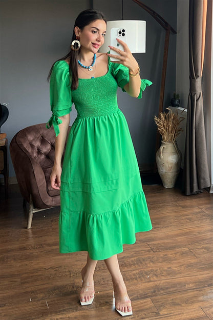 Grazia önü gipeli yeşil çan elbise