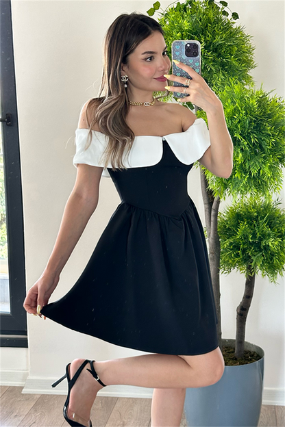 Madonna beyaz yakalı siyah elbise