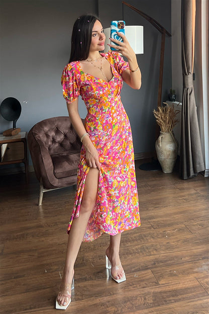 Maura kolları fırfırlı çiçekli yırtmaçlı elbise